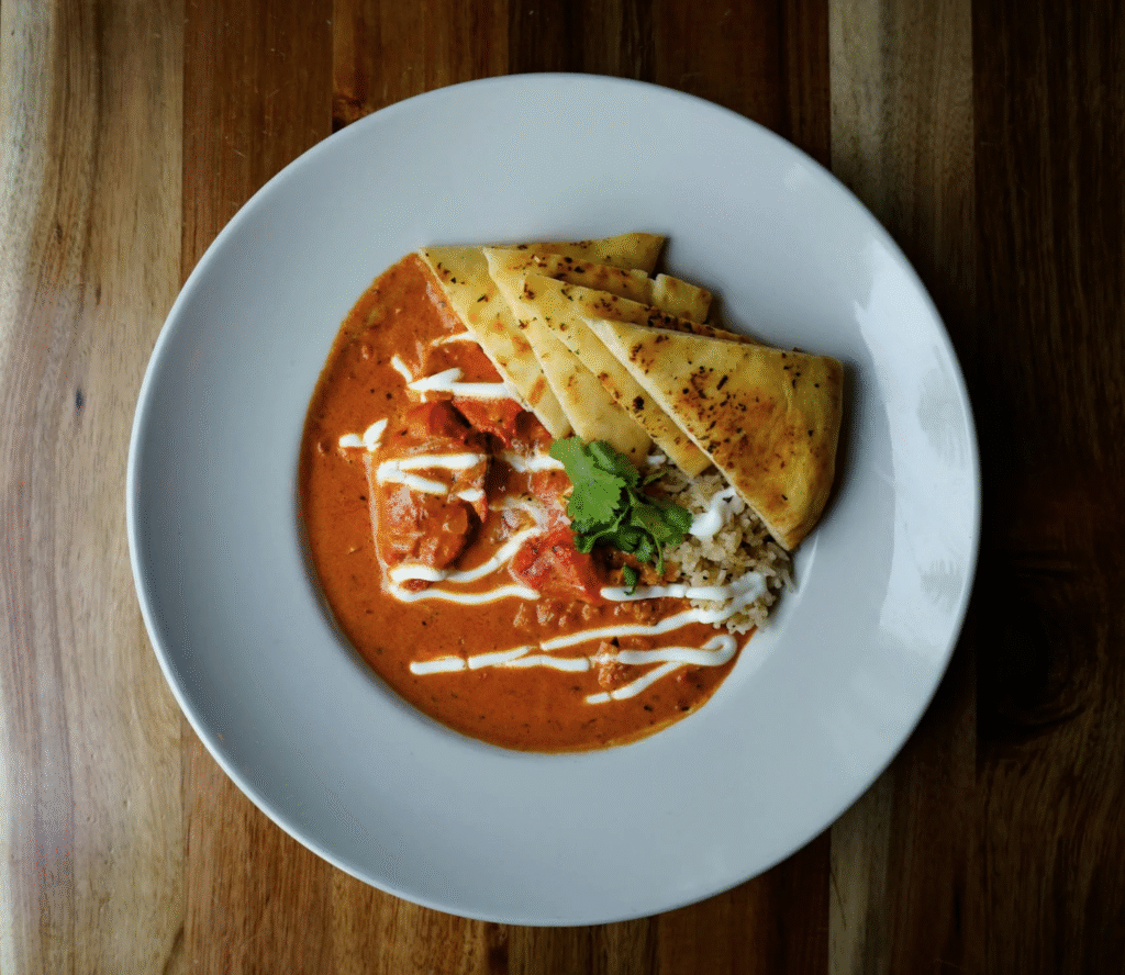 Butter-Chicken-on-White-Ceramic-Plate