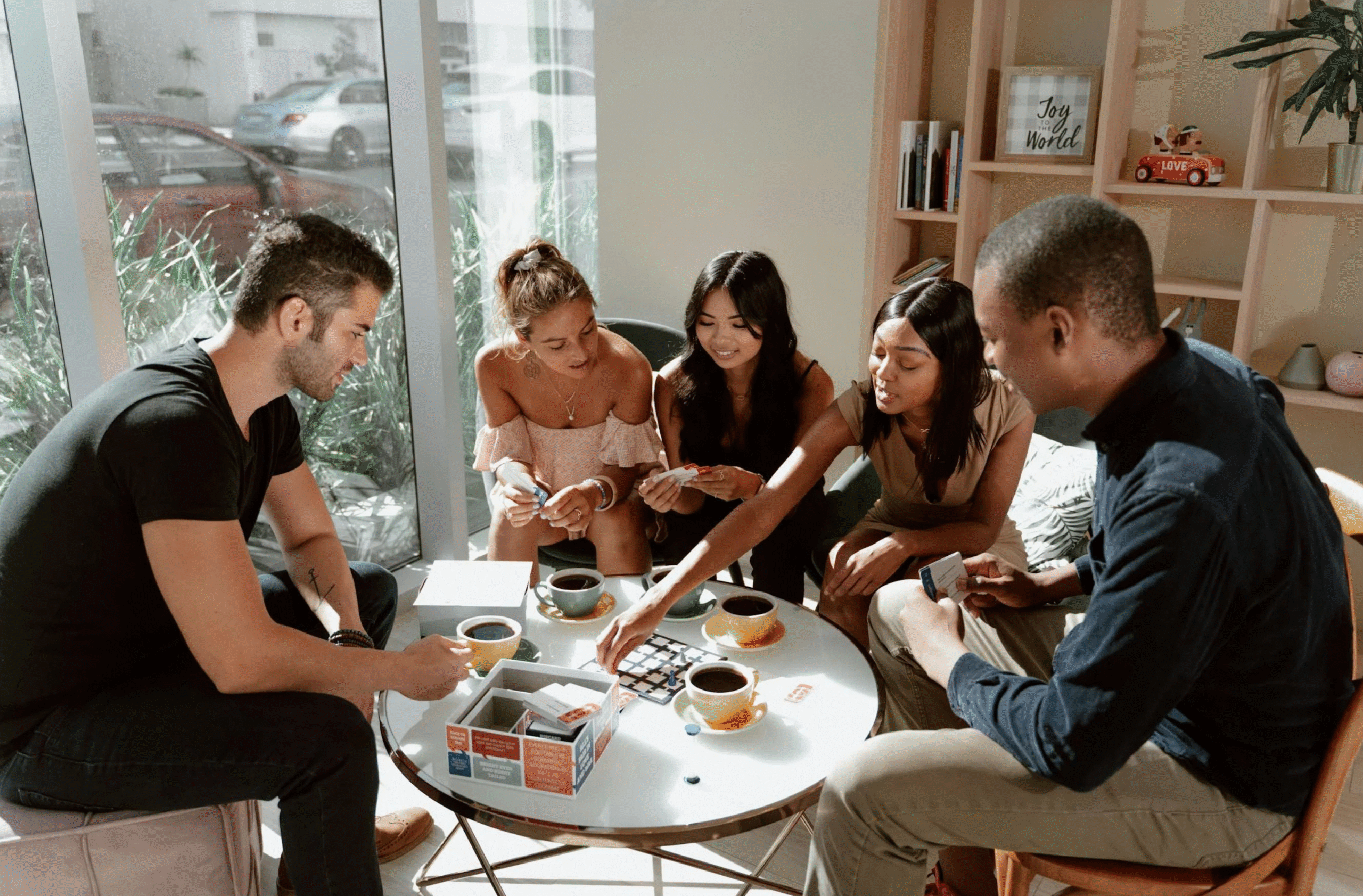 Networking while playing cards and drinking coffee