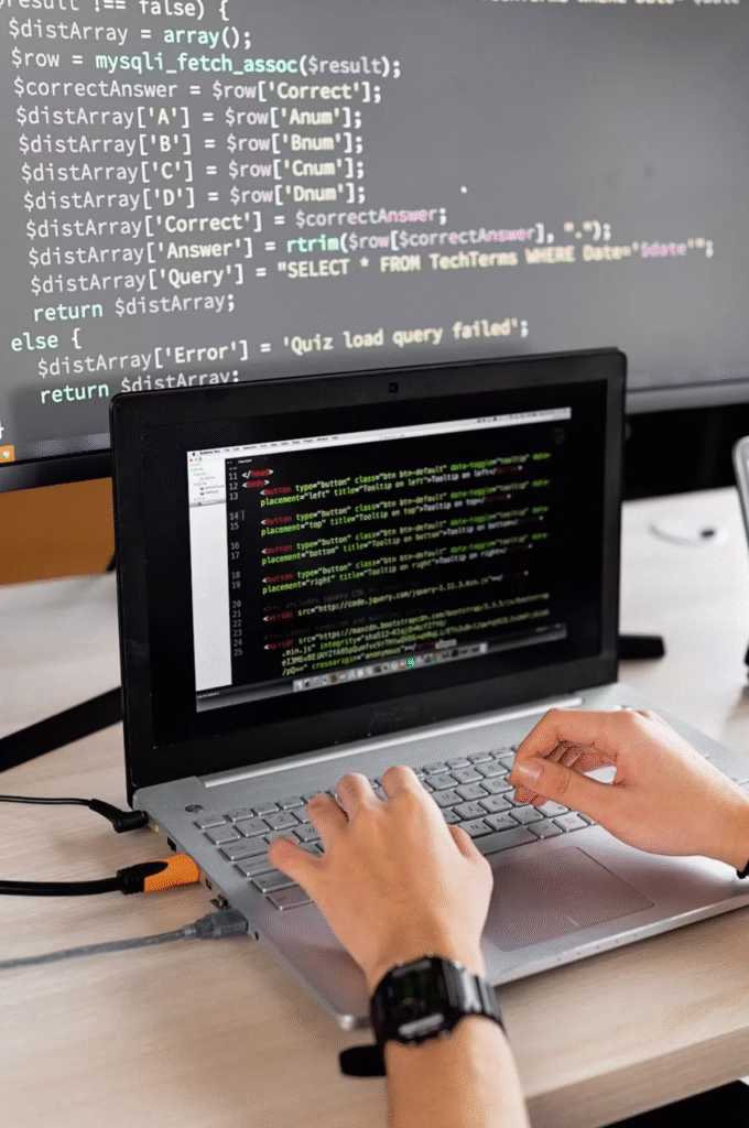 A Woman coding - Computer Programming - ReDI